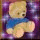 A pixelated teddy bear in a blue shirt against a purple and white speckled background, with visible animation changes across frames.