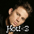 A pixelated image of a person with light brown hair and blue eyes, wearing a black shirt, with text overlay reading "Hot! <3" in white stylized font.