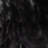 A static image composed of dark gray and black pixels with scattered lighter gray patches, appearing as a low-resolution or heavily compressed visual artifact.