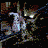 Animated sequence of a skeletal figure with glowing eyes and mouth against dark background, ending with 'DOOM' text in blue box.
