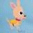 Pixelated cartoon animal with pink ears and yellow body against light blue background, paired with text blocks on white and gray