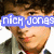Four- of a person with curly brown hair wearing a light gray jacket over a white shirt, each showing different overlaid text or symbols