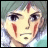 Pixelated anime-style character face with green hair and red cheek markings, next to "AnimeIM" and "com" text on black background.