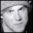 25 grayscale images showing a person wearing a knit hat, with subtle variations in facial expression and head position across the frames