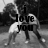 Black-and-white pixelated image of two figures embracing with text "i love you" overlaid in bold, blocky letters.