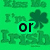 Green background with repeating 'Kiss Me I'm Irish' text and clover symbols, featuring black text overlays reading 'or', 'hug', and 'me'.