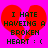 A static pixel art image shows a red broken heart on a bright pink background with black text reading "I HATE HAVING A BROKEN HEART : (".