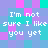 Pixelated text 'I'm not sure I like you yet' repeated across a of cyan, purple, and pink squares with no visible animation changes