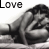 Black-and-white image of a person lying down with arms crossed over chest, text "Love" above in varying color states.