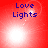 Red background with blue "Love Lights" text and animated white light effects in four quadrants.