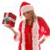 A person in a red and white Santa-themed outfit holding a wrapped gift, with a second view showing the same figure from a different angle.