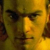 A four- shows a person's face with red text overlays reading 'I FEEL...' and 'EVIL!!!' in the top-right and bottom-left
