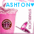Pixelated image showing a pink drink cup with a circular brown pattern, blue text reading 'ASHTON', and a pink object resembling a pen or stylus on white background.