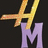 A pixelated static image shows a golden 'A' positioned above a purple 'M', both set against a solid black background.