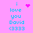 Pixelated text and symbols on a pink background with cyan lettering, featuring animated heart and starburst effects.