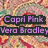 Pixelated image with swirling pastel background, two text blocks in purple and yellow fonts, and a cyan heart symbol.