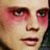 A 50x50 pixel animated contact sheet showing two frames of a buddy icon: left frame features a close-up of a person's face with red eye makeup, right frame shows white stylized text on black background.