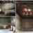 A pixelated static image showing a blurred interior with indistinct shapes and muted tones of brown, gray, and white.