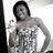 A grayscale image of a person in a strapless dress holding an object, with slight variations