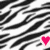 Black and white zebra stripes with a pink heart symbol at the bottom center.