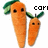 Two pixelated orange carrots with green tops stand side-by-side, each with simple black eyes; partial text 'corn' appears to the right.