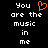 Black background with white pixelated text reading 'You are the music in me' and an orange pixelated heart symbol replacing the 'o' in 'You' on the left side.
