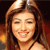 Static 50x50 pixel icon showing a close-up of a smiling person with long brown hair against a dark background, rendered in low-resolution pixel art style.
