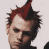 six shows a person with spiky hair in various poses and expressions, including red-tinted hair on the top-left