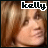 Pixelated image of a person with light brown hair and closed eyes, overlaid with black text reading 'kelly' in pixelated font.