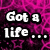 Pixelated text on a pink and black patterned background with white lettering outlined in black.