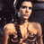 Static pixelated image of a shirtless humanoid figure with light skin tone against dark background, featuring visible facial features and upper torso in low-resolution 49x49 icon format.