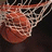 A basketball hoop with a net and a ball, alongside yellow pixelated text reading 'SOFT' and 'BASKETBALL' on black backgrounds.