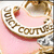 A circular pink icon with a brown border displays the text "FARRELL COURT" in stylized brown lettering, featuring a small red accent dot above the 'R' in FARRELL.