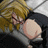 Pixelated anime-style character with blonde hair and glasses lying on a white surface, next to text reading "Anime IM" and "com" on black background.