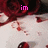 A four- shows a red and white floral background with pink text changing