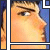 Pixelated profile view of a person with light skin and dark hair against blue background, framed by gray border with colored corner squares.