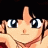 Anime-style character with large blue eyes and brown hair, hand near face, next to text reading 'Anime IM' and 'com' on black background.