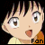 Pixelated anime-style character face with wide eyes and open mouth, wearing orange garment against black background.