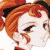Pixelated anime-style character with orange hair and white face, side profile against green background with text.