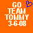 Orange background with white text reading 'GO TEAM TOMMY 36-08' and a blue pixelated heart symbol above the text on the left side.