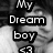 Black-and-white image of a person with dark hair wearing a white shirt, overlaid with text reading "My Dream boy <3" in pixelated font.