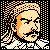 Pixelated static icon of a man's face with orange hair and mustache against black background, surrounded by light yellow dots.