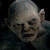 Animated sequence of a pale, bald humanoid with large ears and blue eyes showing multiple facial expressions against a dark background.