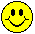 Yellow circular pixelated face with black eyes and mouth, showing multiple expressions including closed smile, open mouth, tongue out, and wink.