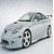 A silver sports car with a rear spoiler appears in four , each showing different text overlays and background variations
