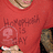 A red-shirted figure with partial face visible, displaying 'Happy 2015' text and a pixelated number '2' on the chest.