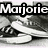 Static grayscale image with bold text 'Majorie' at top, abstract shapes below, and pixelated background.