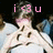 Pixelated image of a person with dark hair and pink bow, wearing white clothing against black background with pink text above head.