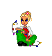 Pixel art of a blonde woman with blue eyes and red lips, wearing green pants and white shirt over red top, holding tangled string lights.
