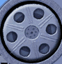 A circular silver film reel icon with six dark blue perforated holes, a central hub, and radiating lines on its surface.